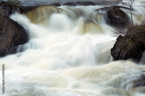 Silky water of Cargill Falls in Putnam  Connecticut in springtime.