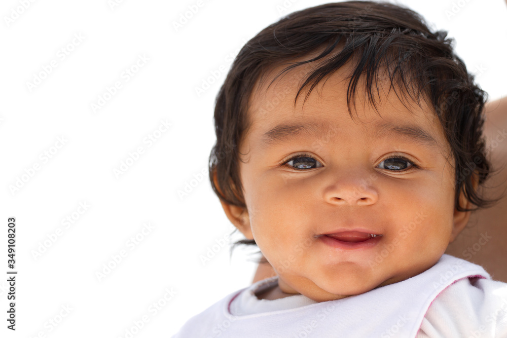 Portrait of a cute little Hispanic baby smiling. Portrait of a cute little Hispanic baby smiling.