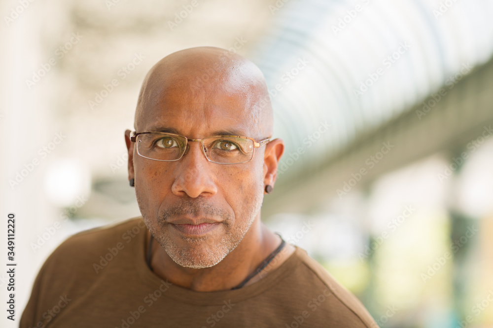Mature African American man smiling wearing glasses. Mature African American man smiling wearing glasses.