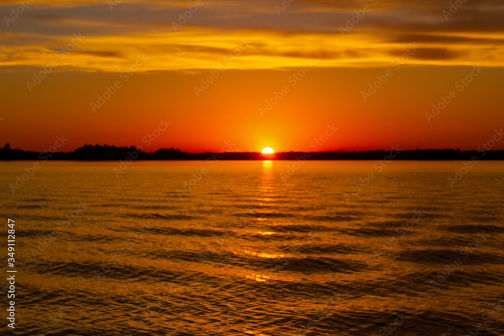 Naklejka premium sunset at the beach