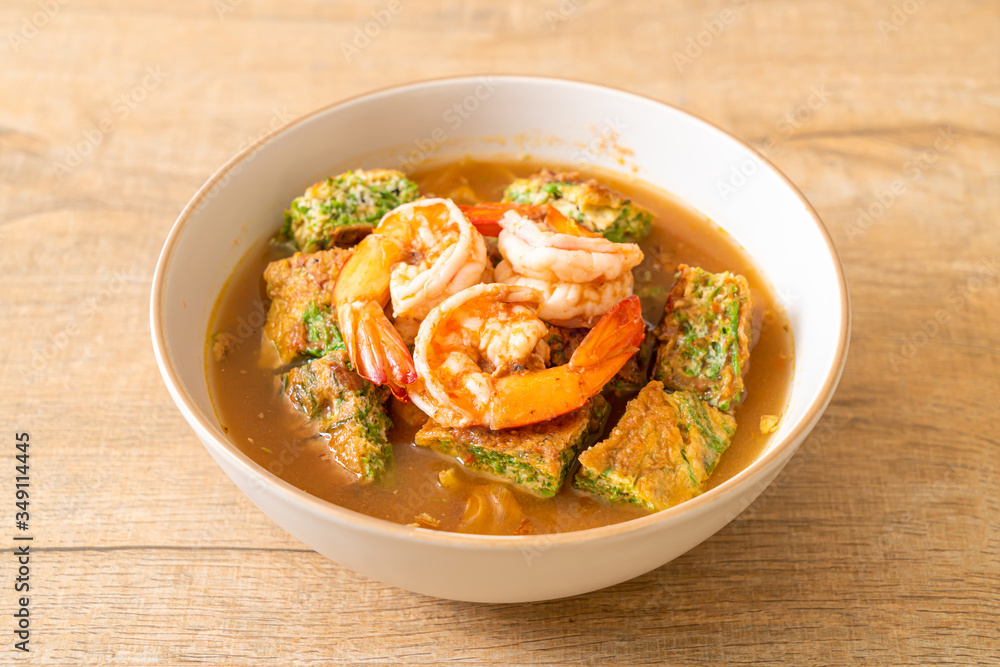 Sour soup made of Tamarind Paste with Shrimps and Vegetable Omelet Sour soup made of Tamarind Paste with Shrimps and Vegetable Omelet