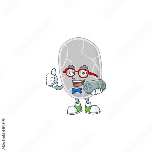 Cartoon mascot design of nitrospirae play a game with controller