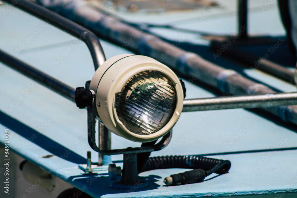  Closeup of a boat moored in the port  - obrazy, fototapety, plakaty 