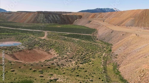 Aerial: Mining tailings from a closed gold mine. Eureka, USA photo