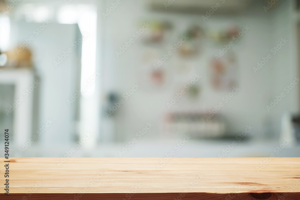 Wood desk space and blurred of kitchen background. for product display montage. business presentation. Wood desk space and blurred of kitchen background. for product display montage. business presentation.