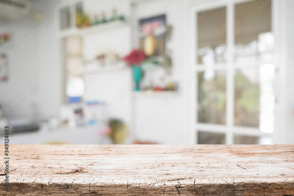 Wood desk space and blurred of kitchen background. for product display montage. business presentation. Wood desk space and blurred of kitchen background. for product display montage. business presentation.
