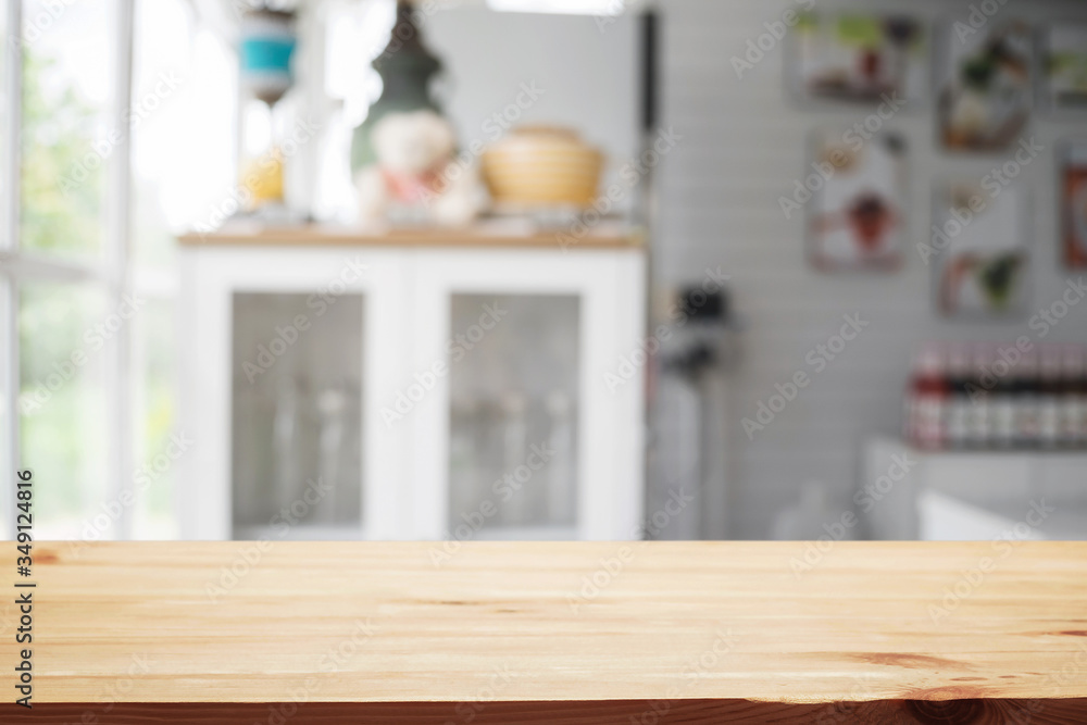 Wood desk space and blurred of kitchen background. for product display montage. business presentation. Wood desk space and blurred of kitchen background. for product display montage. business presentation.