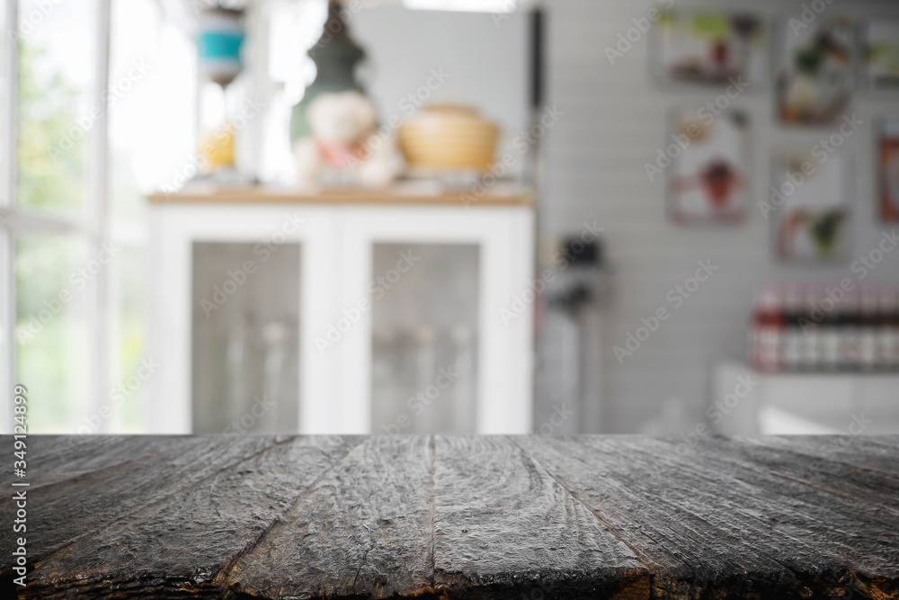 Wood desk space and blurred of kitchen background. for product display montage. business presentation.