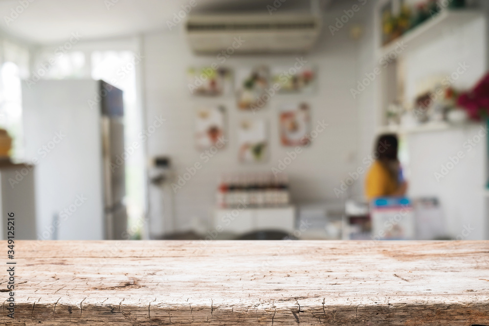 Wood desk space and blurred of kitchen background. for product display montage. business presentation. Wood desk space and blurred of kitchen background. for product display montage. business presentation.