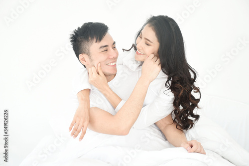 asian couple love in bed