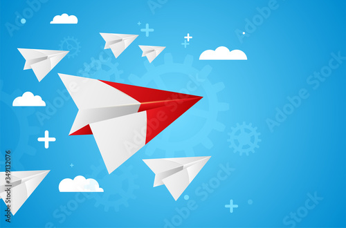 Group of paper planes with leader on blue background