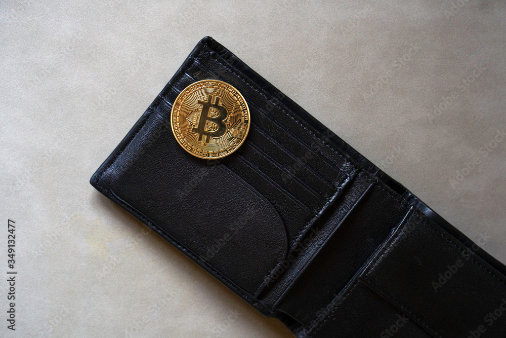 Virtual currency wallet. Bitcoin gold coin. Cryptocurrency concept. Bitcoin cryptocurrency.Worldwide virtual internet money. Bitcoin BTC stock exchange trading background concept. business Virtual currency wallet. Bitcoin gold coin. Cryptocurrency concept. Bitcoin cryptocurrency.Worldwide virtual internet money. Bitcoin BTC stock exchange trading background concept. business