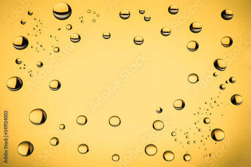 abstract background with water drops yellow