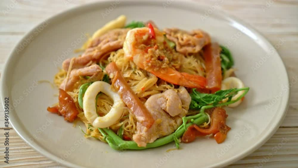 Stir-fried rice vermicelli and water mimosa with mix meat Stir-fried rice vermicelli and water mimosa with mix meat