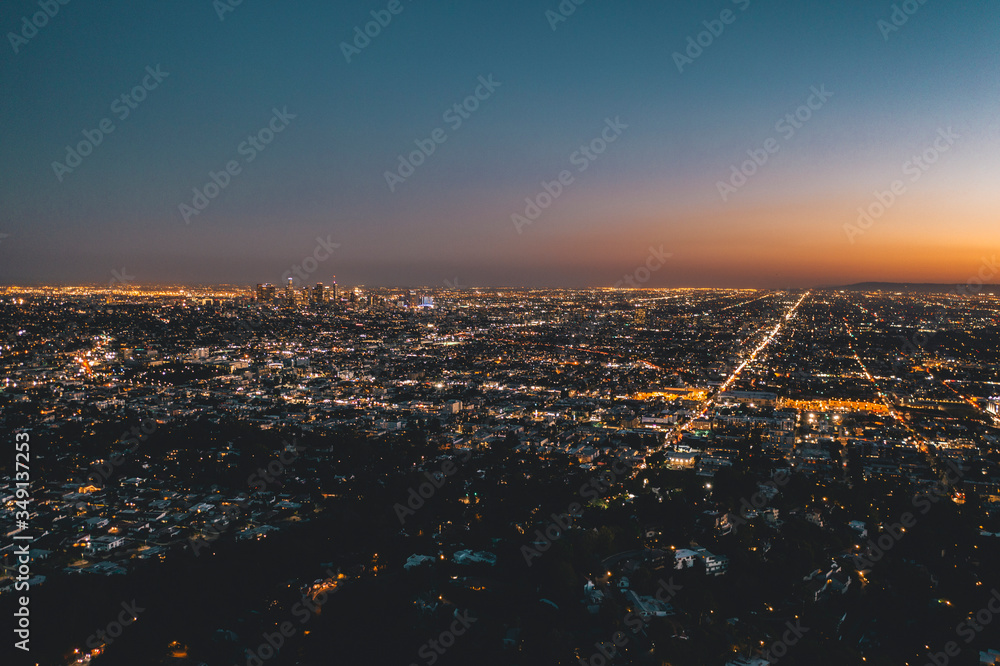 Aerial Wide View over Glowing Los Angeles, California City Lights Scape
