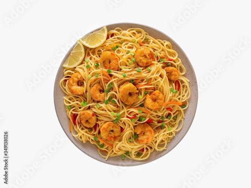 Isolated prawn Schezwan Noodles with vegetables in a plate