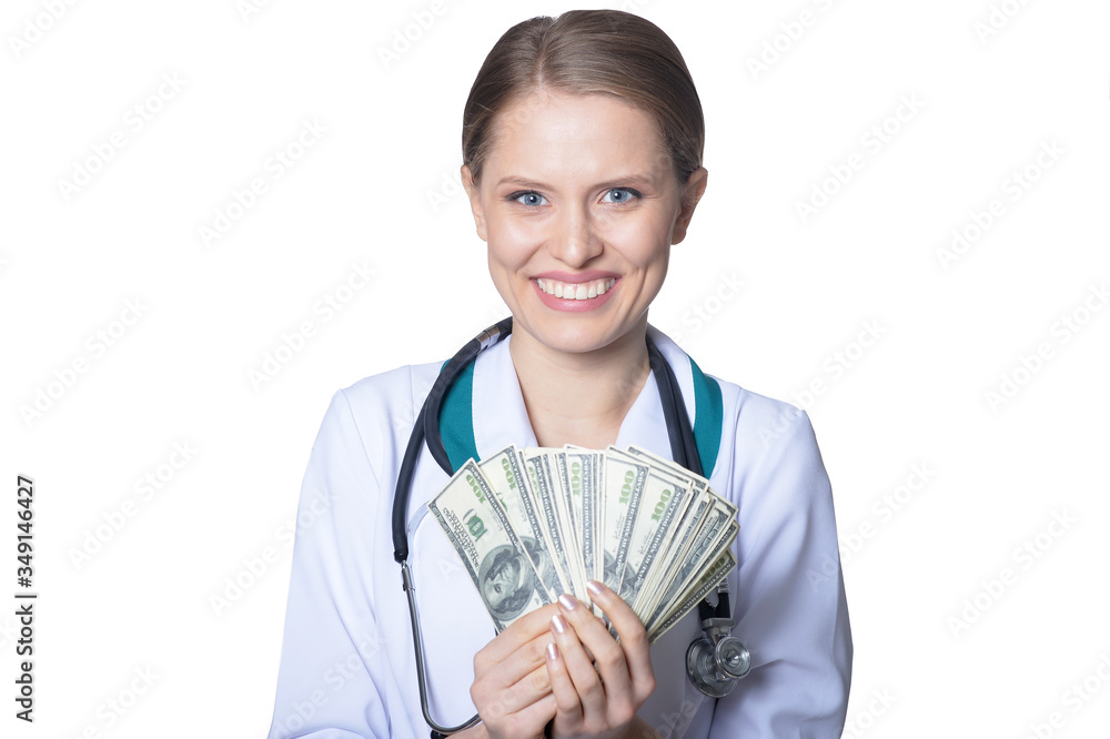 Female doctor holding money isolated on white background Female doctor holding money isolated on white background