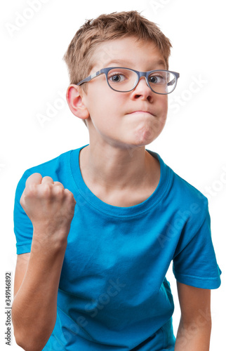 Blond hair serious boy in glasses showing his fist  isolated on white background