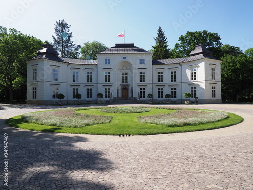 Scenic myslewicki palace in baths park in Warsaw city in Poland photo