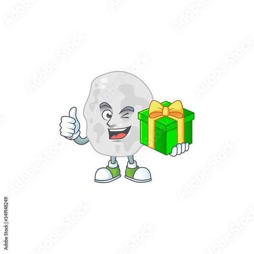 Happy smiley planctomycetes cartoon mascot design with a gift box