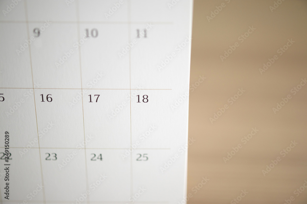 calendar page close up on wood table background business planning appointment meeting concept - obrazy, fototapety, plakaty 