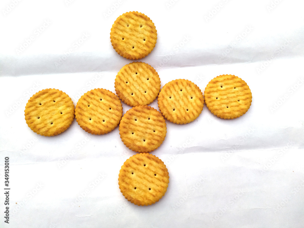 Stack of sweet meal digestive biscuits isolated on white Stack of sweet meal digestive biscuits isolated on white
