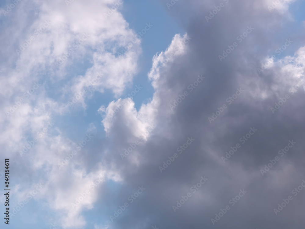 Fototapeta premium Black clouds with blue sky for background