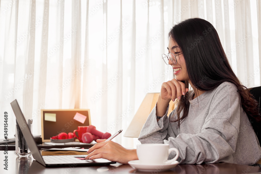 Close up woman is working at home. Freelancer woman is thinking idea for work. work at home concept. Close up woman is working at home. Freelancer woman is thinking idea for work. work at home concept.