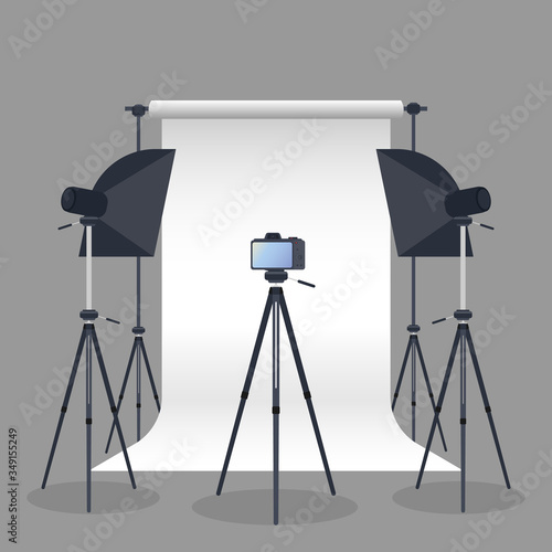 Photo Studio Vector. Blank white canvas background on tripods. Camera on a tripod, softbox. Professional photo studio.