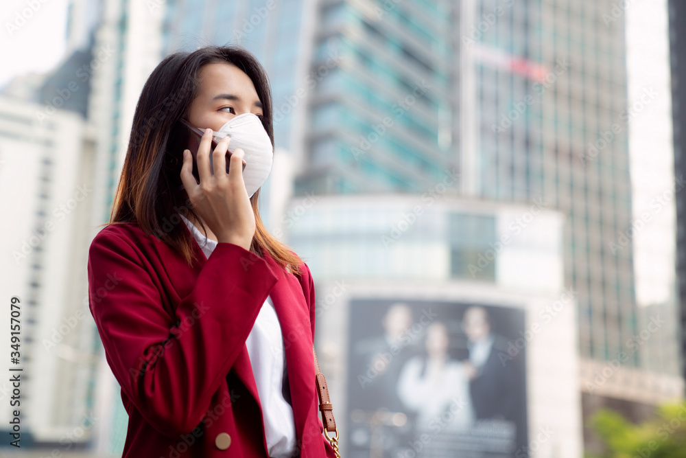 Fototapeta premium Asian girl use a protection mask