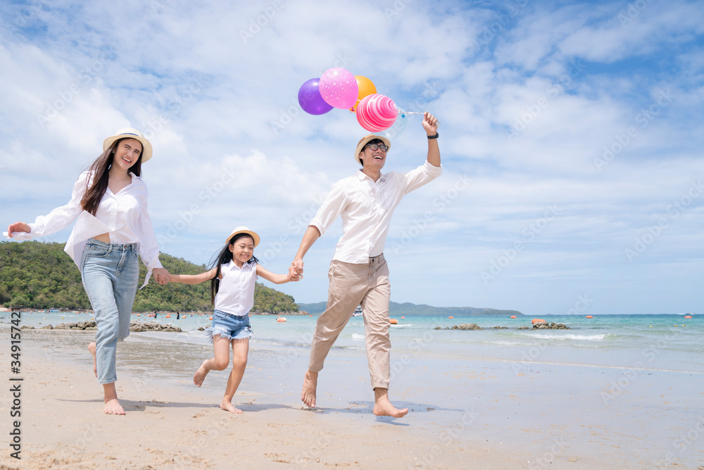 happy family enjoy summer vacation on the beach