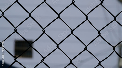 metal fence with barbed wire