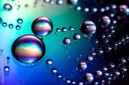 Water droplets iridescent in different colors