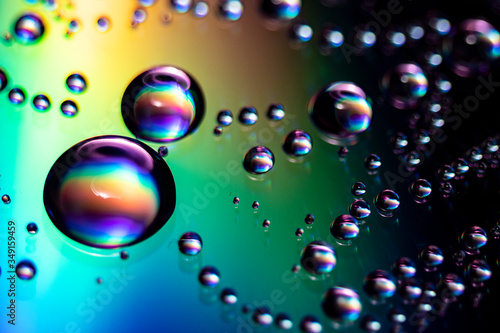 Water droplets iridescent in different colors