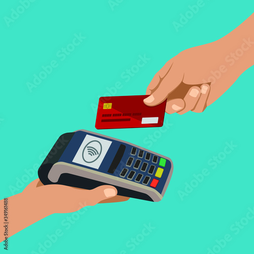 Using credit card for contactless payment. Holding credit card near nfc terminal. Cashless technology. Pos machine confirms the payment.