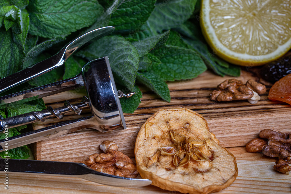Fototapeta premium Fruits and kitchen herbs still life in the kitchen