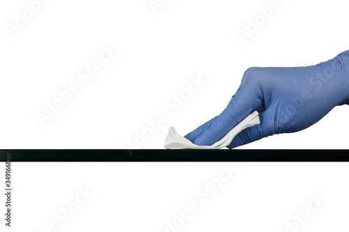 Gloved hand cleaning a glass surface with a piece of antibacterial cleansing wipe isolated on white background 
