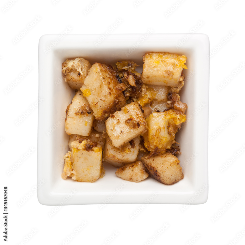 Asian cuisine - Fried carrot cake in a square bowl isolated on white background;
Asian cuisine - Fried carrot cake in a square bowl isolated on white background;