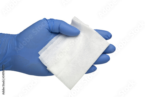 Fotografía Gloved hand holding an antibacterial cleansing wipe