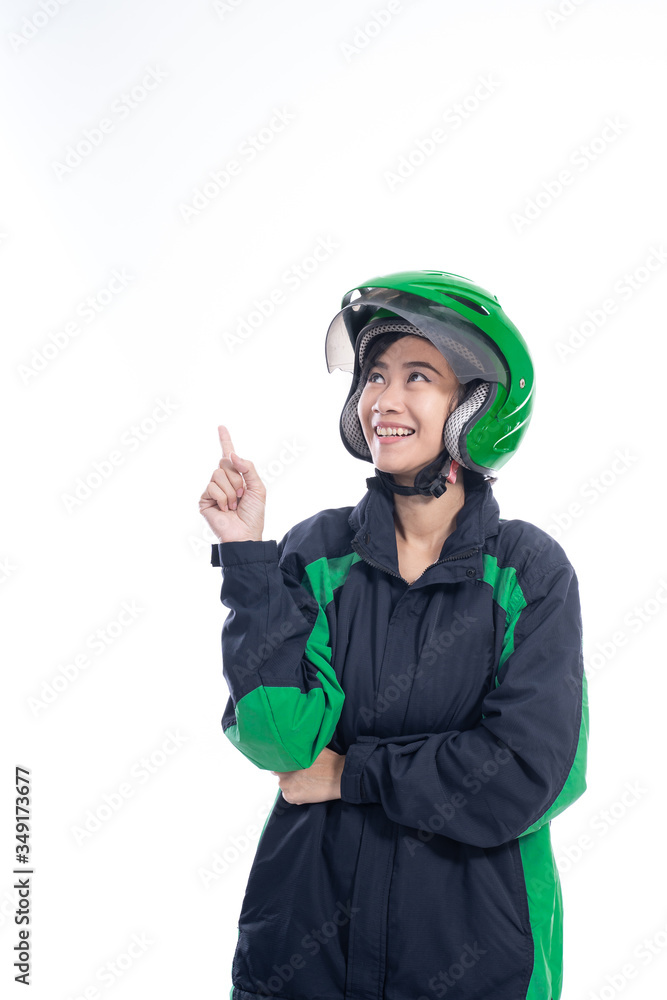 Fototapeta premium female uber taxi driver presenting to copyspace isolated over white