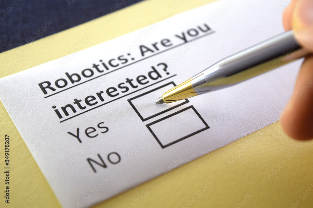 One person is answering question about robotics. One person is answering question about robotics.
