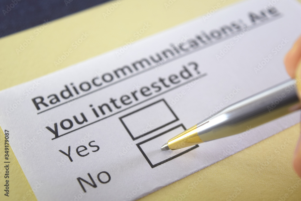 One person is answering question about radiocommunications. One person is answering question about radiocommunications.