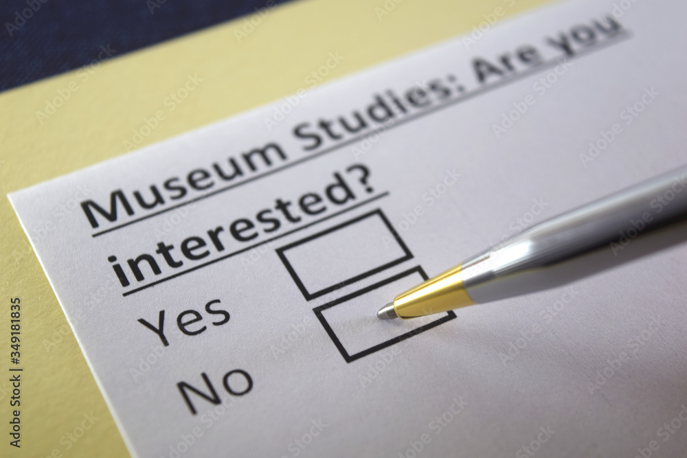 One person is answering question about museium studies. One person is answering question about museium studies.