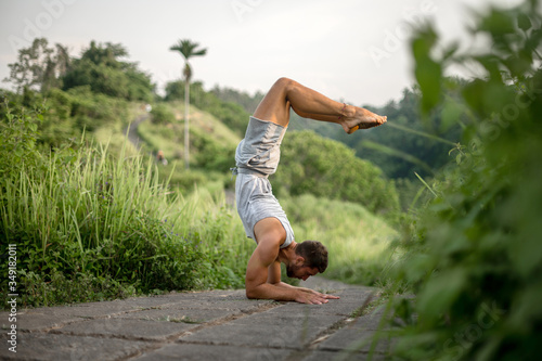 Man practice Yoga practice and meditation outdoor