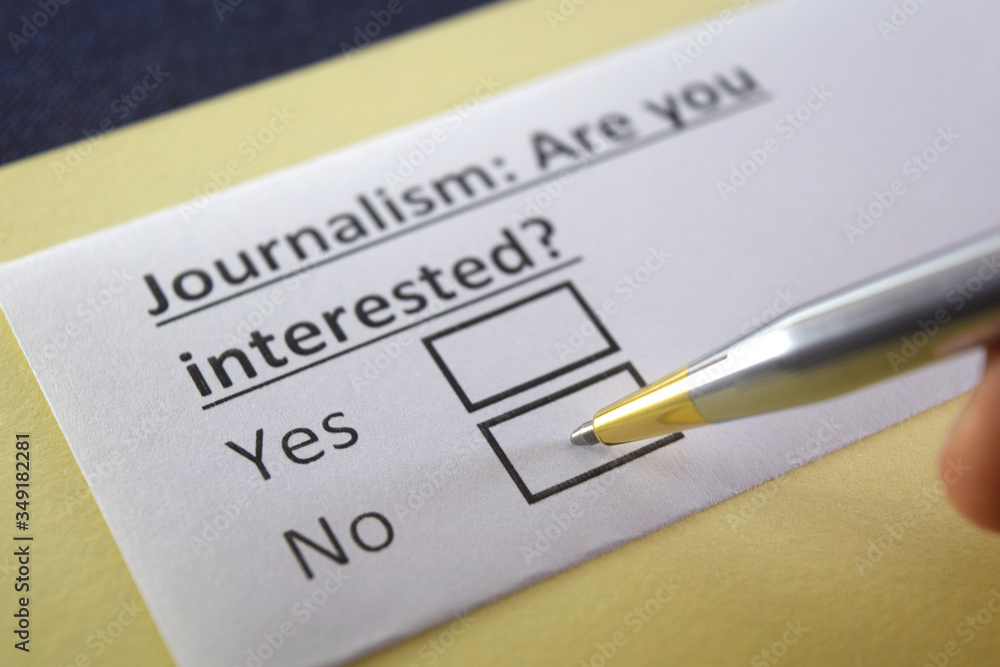 One person is answering question about journalism. One person is answering question about journalism.