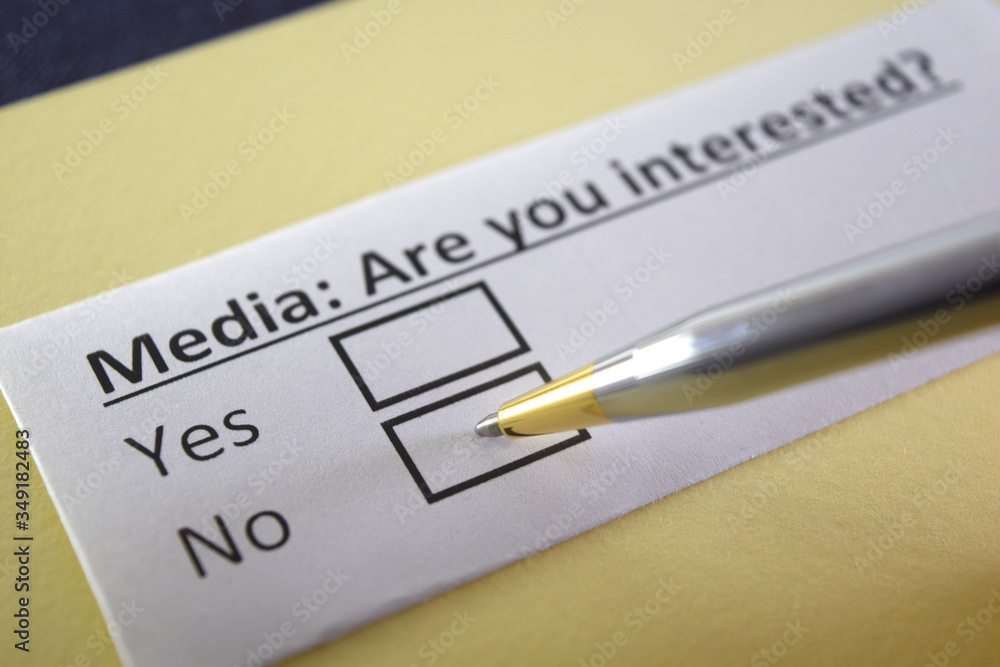 One person is answering question about media. One person is answering question about media.
