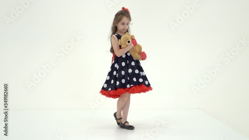 Wallpaper Mural Pretty Long Haired Girl Wearing Polka Dot Dress Posing with Teddy Bear Torontodigital.ca