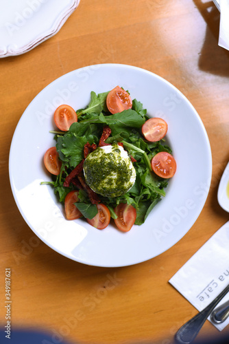 healthy salad plate, fit with lots of greens and low-calorie photo