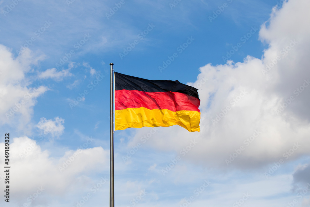 Germany flag closeup in wind. red, black and yellow colors. Germany flag closeup in wind. red, black and yellow colors.
