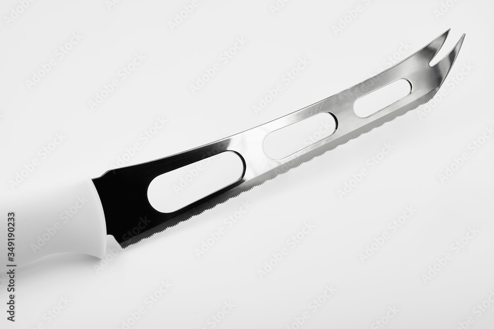 Obraz premium Cheese knife on white background